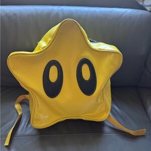 Star Shaped Yellow Backpack with Black Eyes